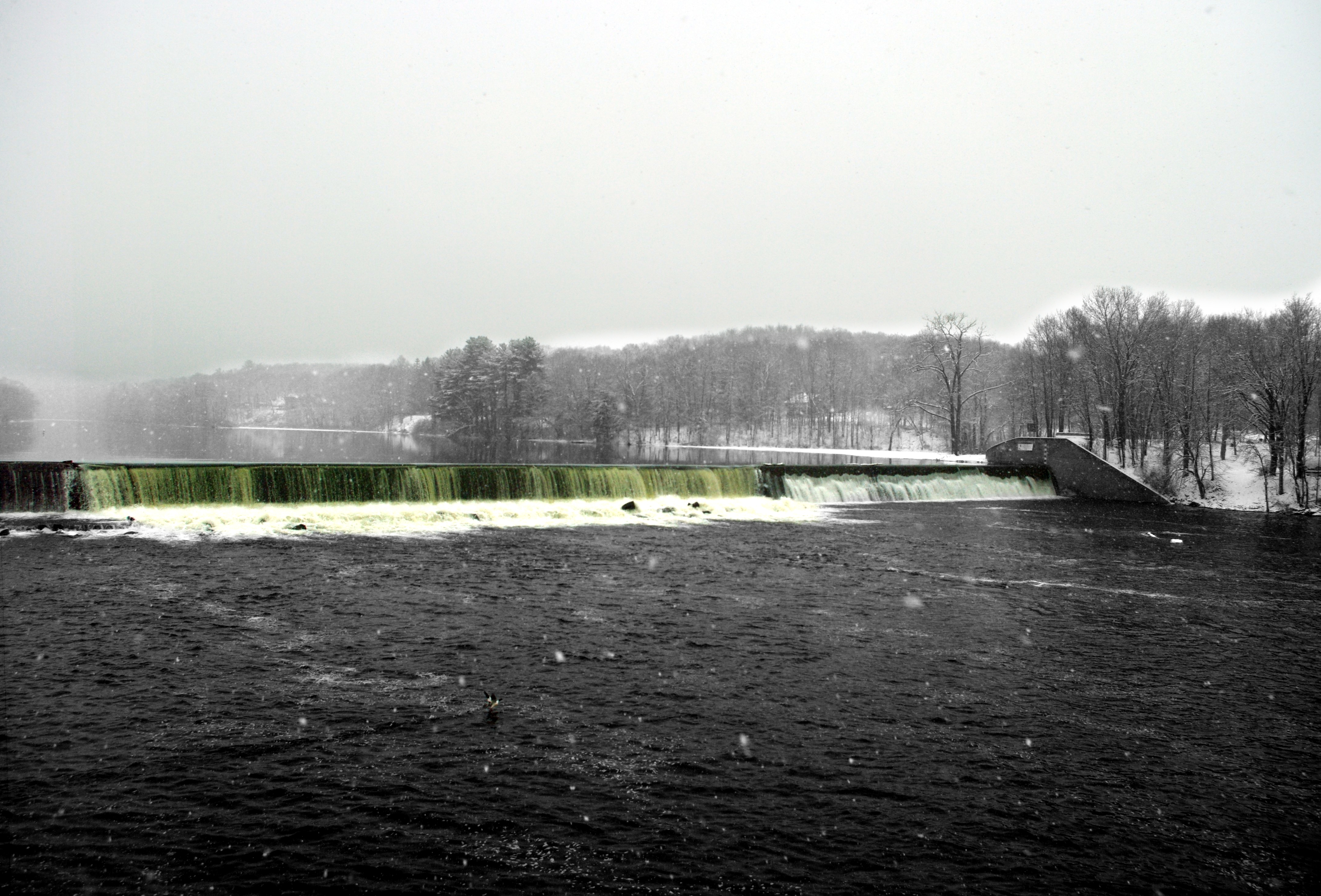 Picture of the Occum Dam during the Spring snow storm of 2015